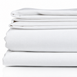 Pictured: White sheets of different sizes neatly folded and stacked on top of each other against a white background.