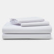 Pictured: Neatly stacked sheet set against a white background. The products featured are the New Era T-180 Sheets.