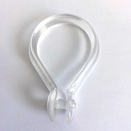 Pictured: Clear plastic teardrop shaped shower hook against a white background.