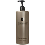 Pictured: Dispenser version of the Terra Pure Green Tea Lemongrass Hand Wash against a white background. The product comes in a bronze colored bottle with black writing and a black dispenser.