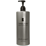 Pictured: Dispenser version of the Terra Pure Green Tea Lemongrass Lotion against a white background. The product comes in a silver colored bottle with black writing and a black dispenser.